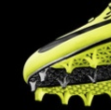 running shoe with cleat